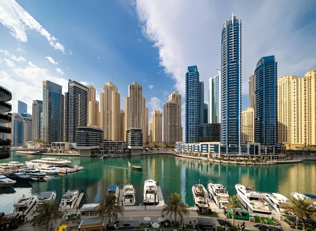 Buildings in Dubai's International City under a clear blue sky, showcasing options for international city rent.