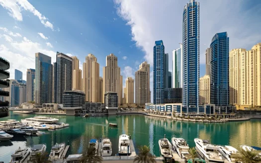 Buildings in Dubai's International City under a clear blue sky, showcasing options for international city rent.