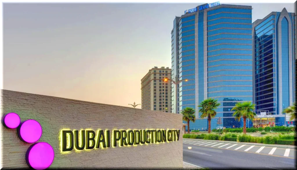 A panoramic view of Dubai Production City (DPC) and International Media Production Zone (IMPZ) showcasing modern commercial buildings, media offices, and green landscapes.