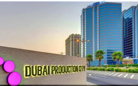 A panoramic view of Dubai Production City (DPC) and International Media Production Zone (IMPZ) showcasing modern commercial buildings, media offices, and green landscapes.